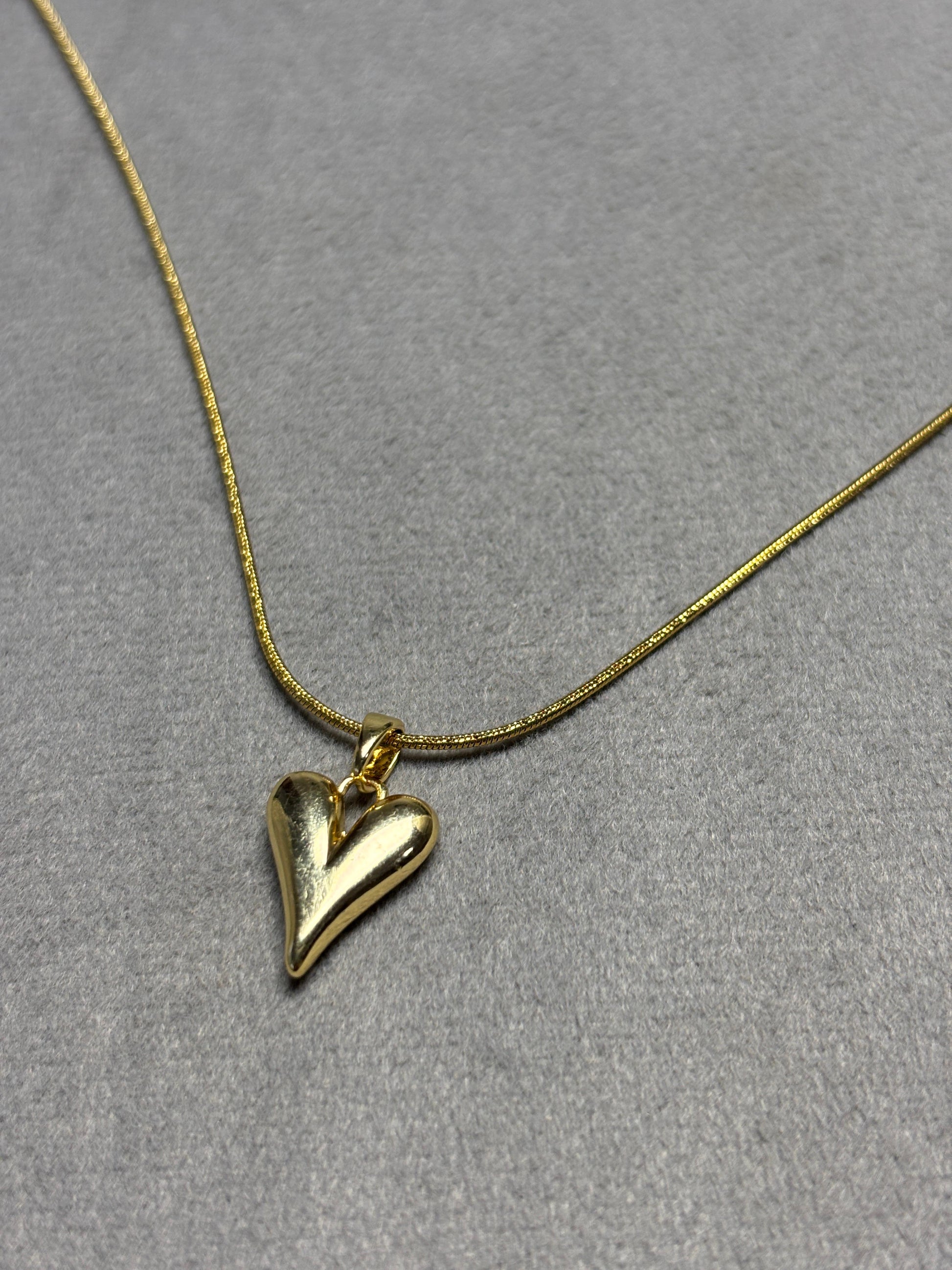 Heart Pendant Necklace in Hand