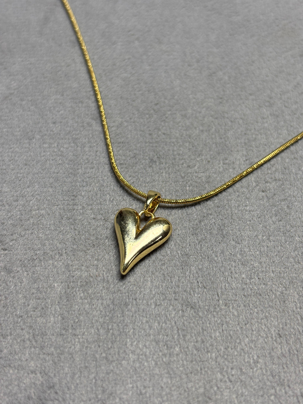 Heart Pendant Necklace in Hand