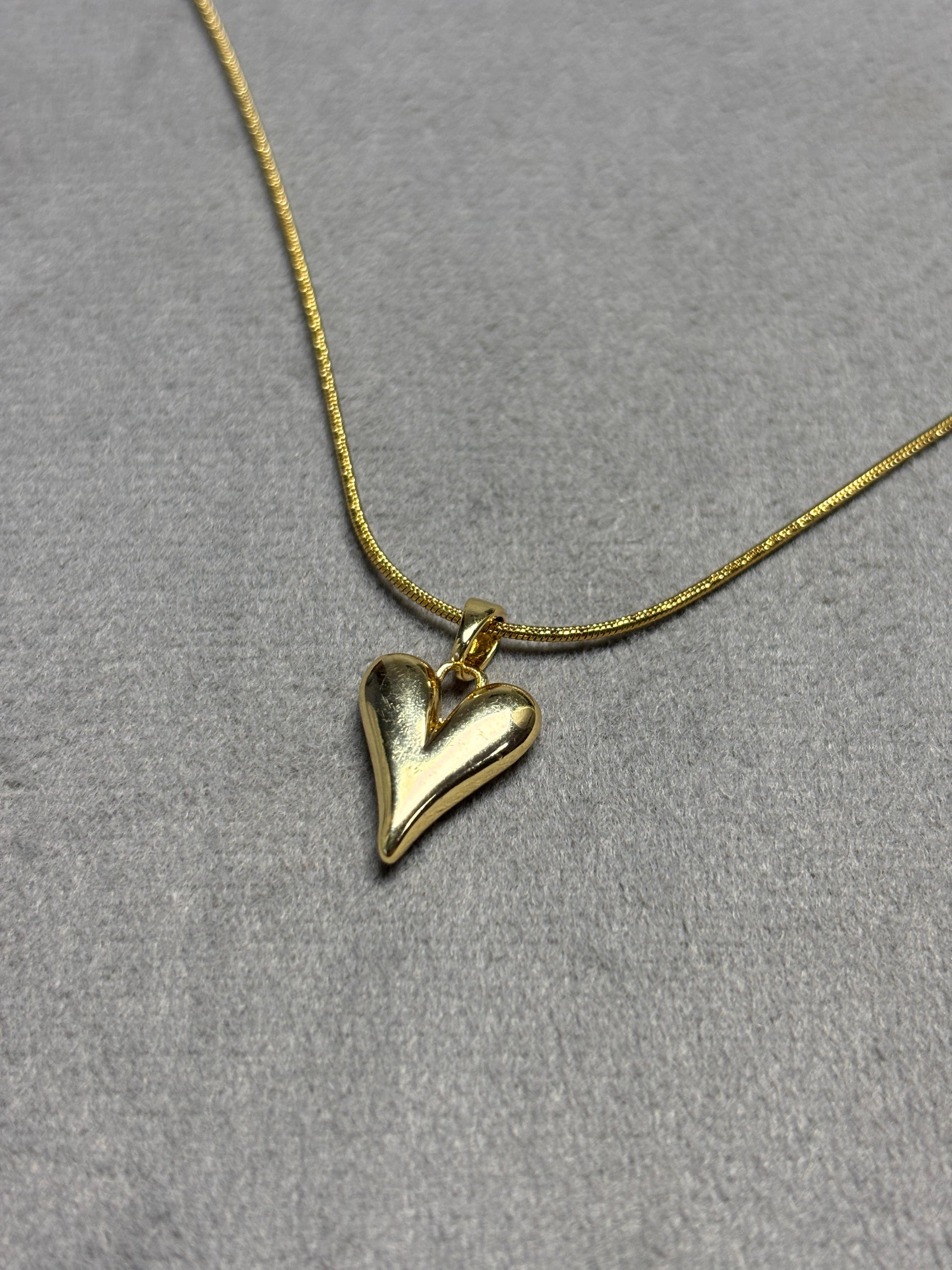 Heart Pendant Necklace in Hand
