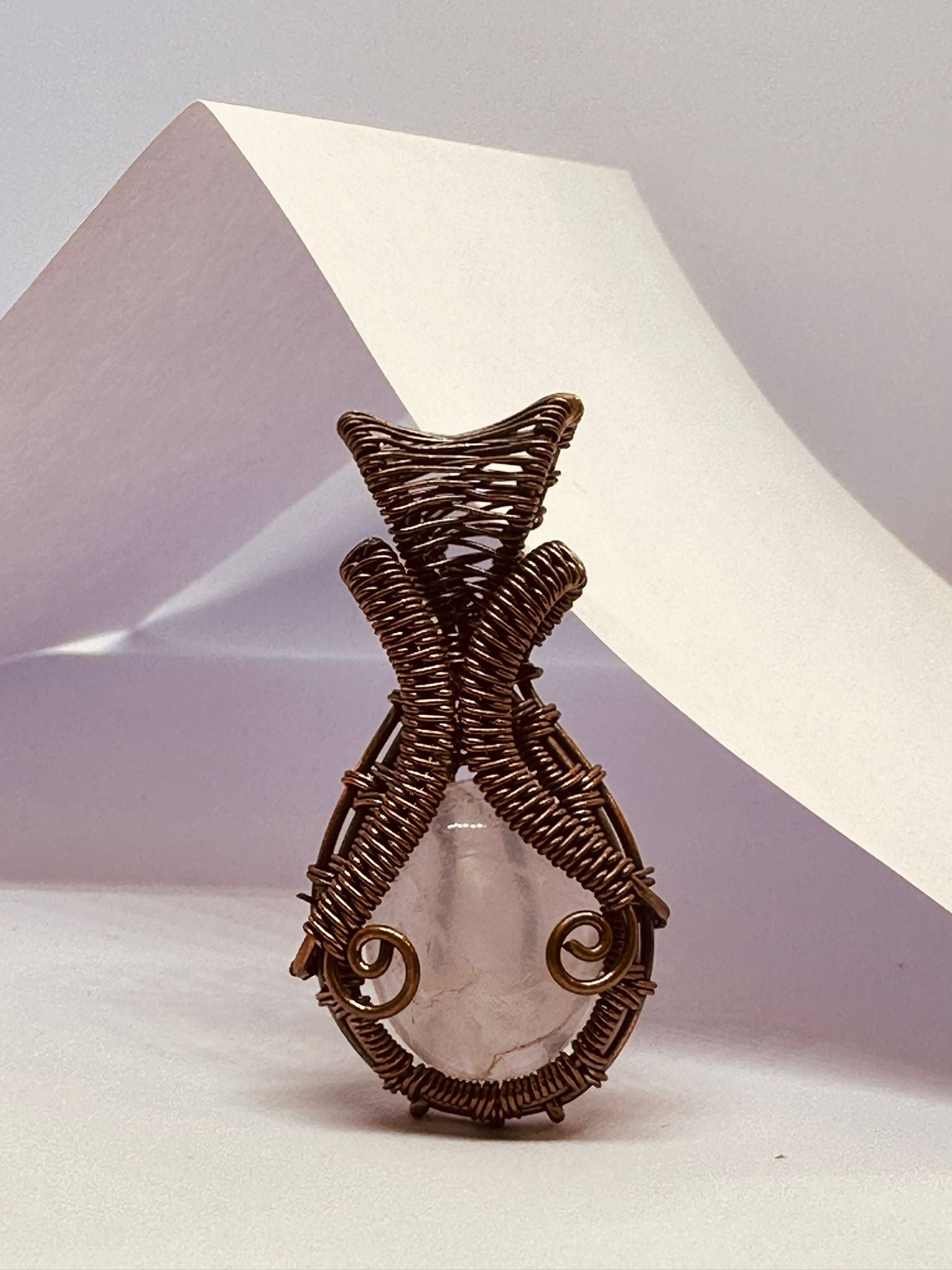 Light-Coded Twilight Tear –  Handmade Hand-Woven Rose Quartz Pendant