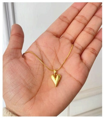 Heart Pendant Necklace in Hand