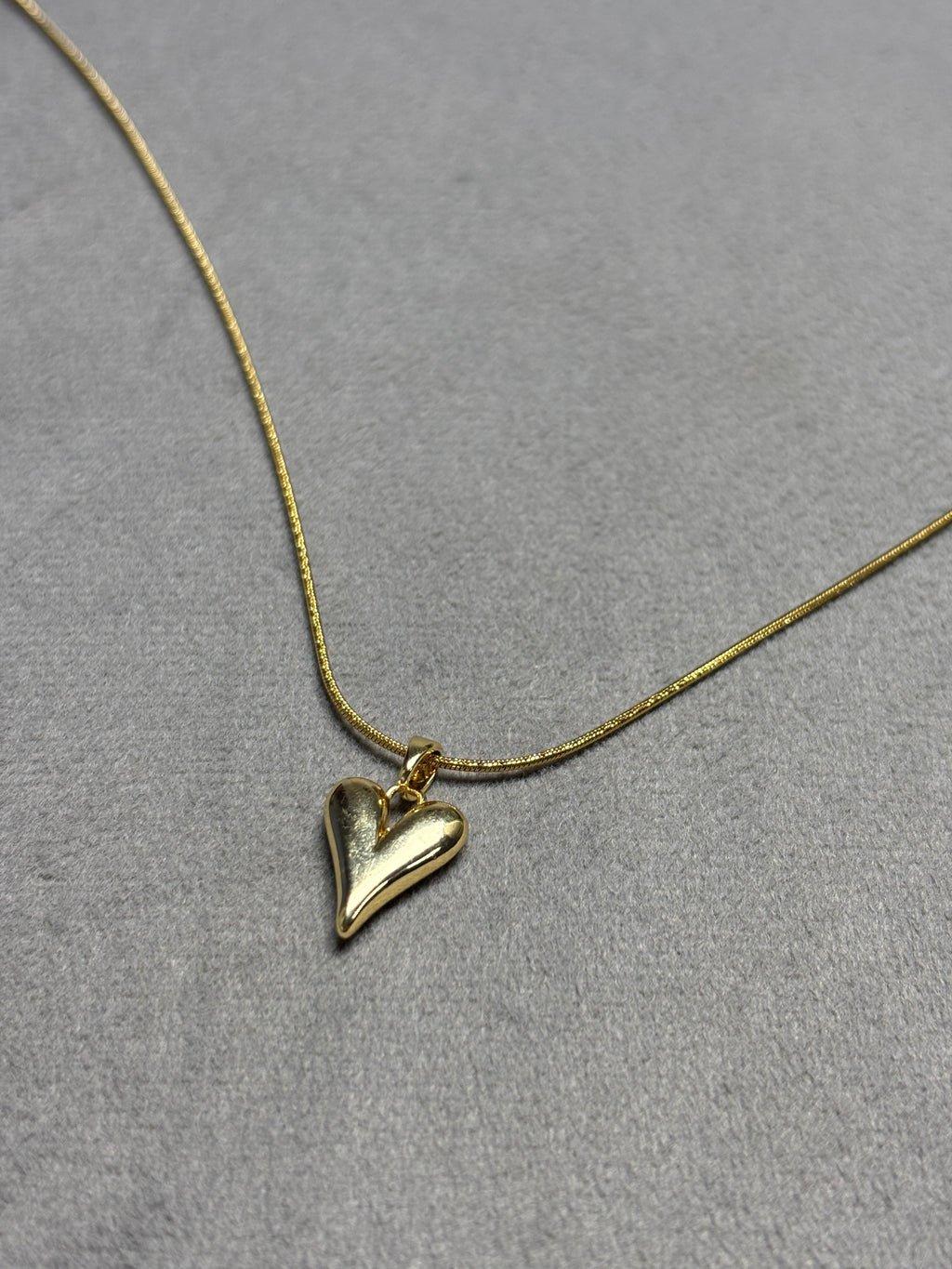 Heart Pendant Necklace in Hand